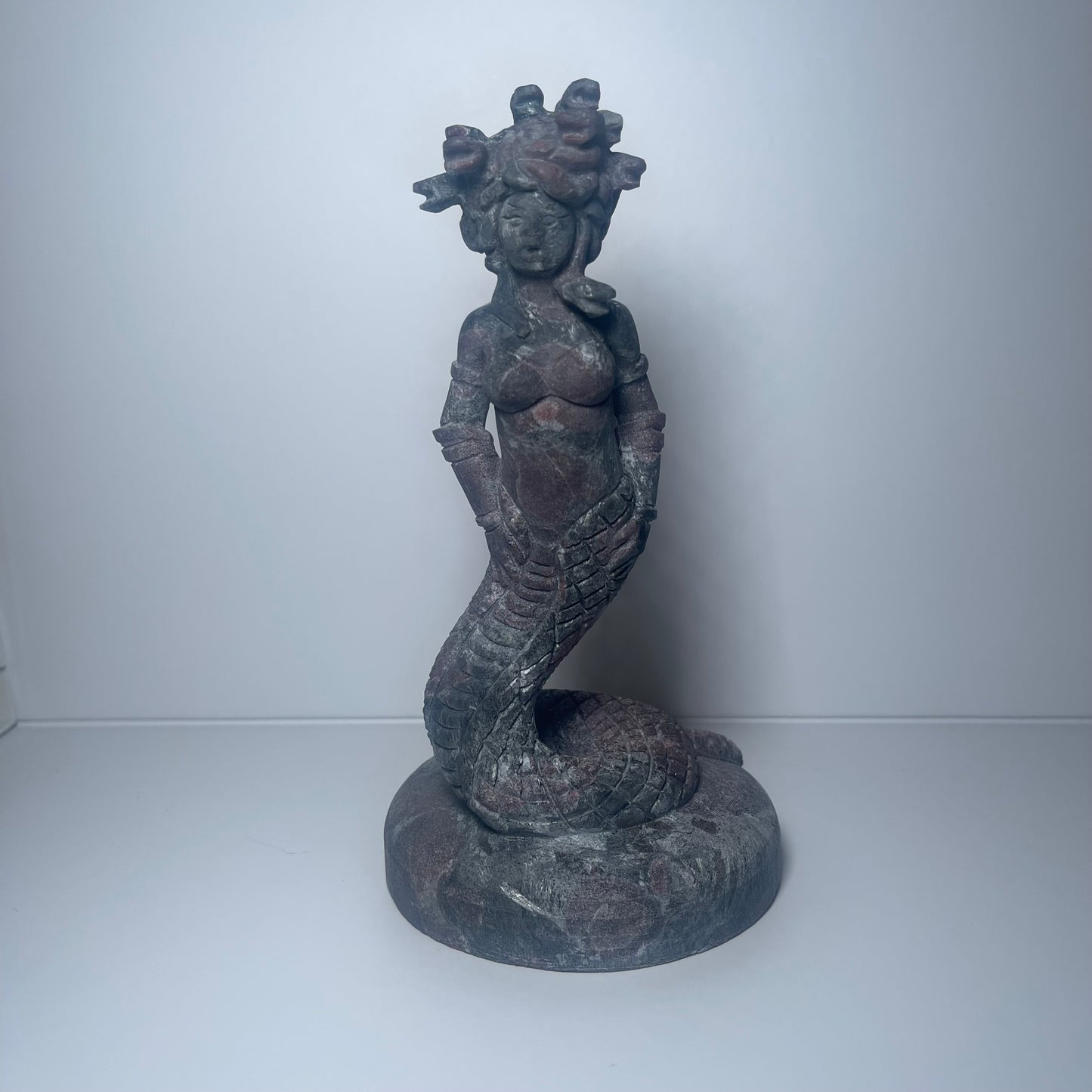 Garnet Medusa Carving